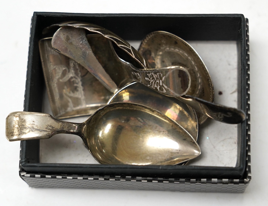 Five assorted silver caddy spoons, including shovel bowl by Cocks & Bettridge, Birmingham, 1810, 61mm, leaf bowl by William Pugh, Birmingham, 1814, Eley & Fearn, London, 1804, bright cut engraved bowl, George Baskerville